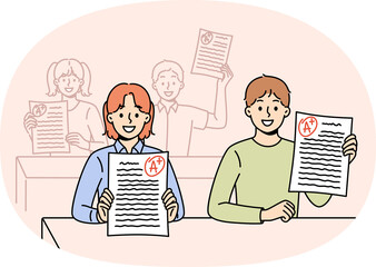Smart schoolchildren demonstrate excellent exam test results, sitting at desks in classroom. Schoolchildren receive education in primary school and rejoice at good grade from teacher © Dzianis Vasilyeu