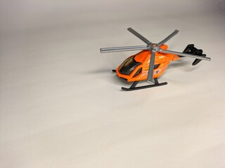 Classic toy helicopter icon, depicting a charming aircraft with spinning rotors. Suitable for a...