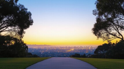 Night skyline glimmering with city lights, bordered by silhouettes of trees and mountains, offering a peaceful retreat amidst urban life.