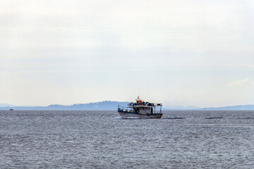 Fishing Adventures: Fisher in Small Boat at Sea in Tunisia, North Africa