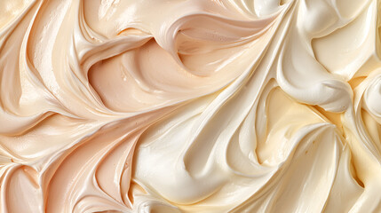 Obraz premium Swirls of creamy, light-colored frosting create a smooth and visually appealing textured background.