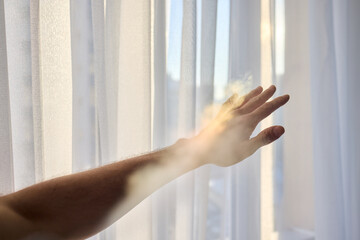 Reaching for the Beautiful Light That Filters Through Delicate Sheer Curtains, Embracing Peace