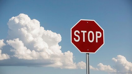 Traffic sign, red road stop sign with texture on a blue sky and clouds background
