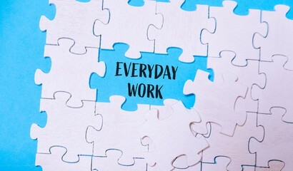 Puzzle with the words everyday work written in the middle