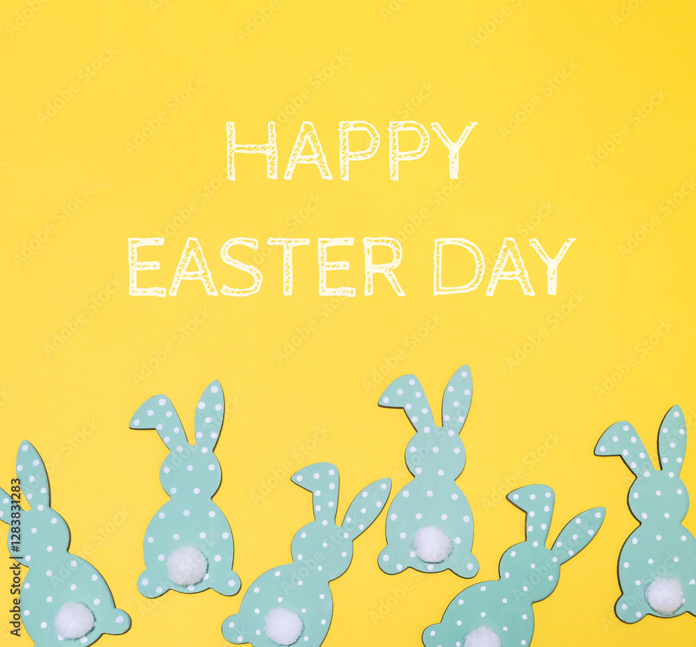Poster yellow background with a group of green rabbits