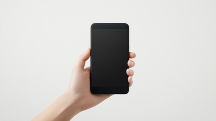 Person Holding Blank Smartphone in Front of Light Gray Background