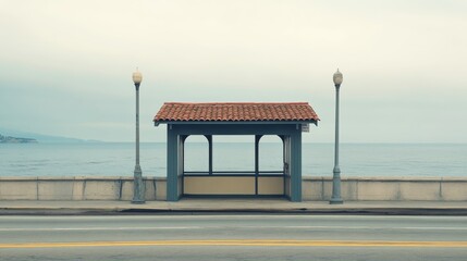 A toll booth on a bridge in a coastal town. Featuring moderate traffic and ocean view