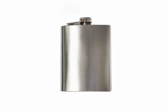 metal flask in a vertical position on a white background. Made of stainless steel, it has a smooth surface and an ergonomic shape. The minimalist design makes it an ideal choice for tourists, 