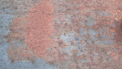 Rust on the iron door for the background. old peeling paint on rusty grates. Rusty metal texture.