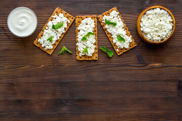 Cereal toasts with cottage cheese for healthy breakfast, top view