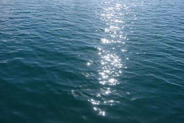 Sunlight Reflecting on Rippled Water Surface