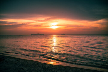 Fototapeta premium Sunset on the Murni beach at Yan, Kedah, Malaysia