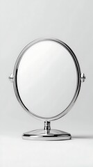 Fototapeta premium Elegant Oval Mirror on a Stand with Polished Chrome Finish Against a Soft Gray Background
