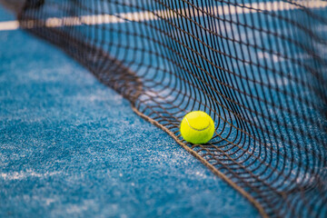 Padel or tennis ball. Background with copy space. Sport court and ball. Social media template....