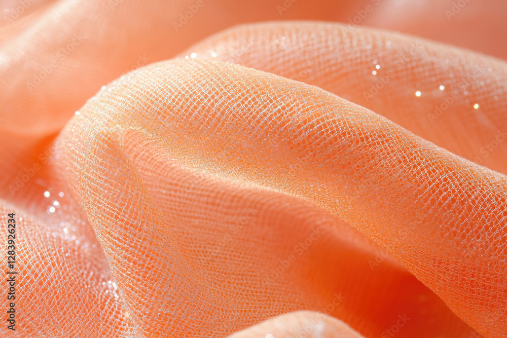 Poster Close-up of delicate, peach-colored fabric with a subtle shimmer and intricate net-like texture.
