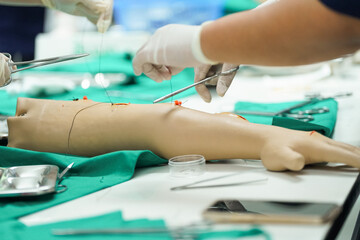Nursing Students Practicing Surgical Suturing.
