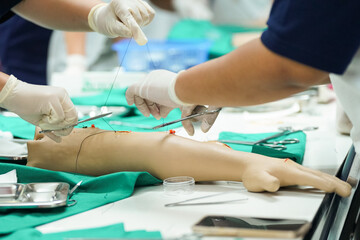 Nursing Students Practicing Surgical Suturing.