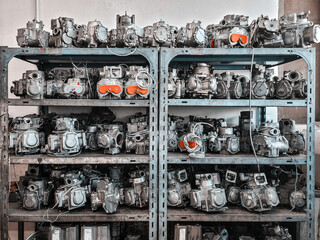 Workshop shelves full of flowmeters