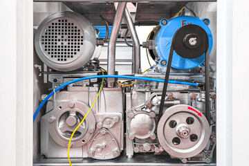 Detail of motor with pump and belt drive