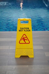 caution wet floor at pool