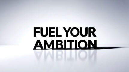 Fuel your ambition with inspiring words in strong typography on a clean surface