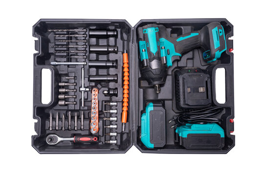 Cordless impact wrench and drill kit with accessories in case on transparent background