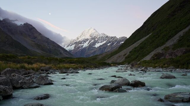 Landscape of Mount Cook with stream flowing in the evening at Hooker valley track, New Zealand