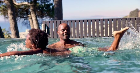 Swimming, pool and dad with child in pool for learning aquatic skills, development and exercise. Black family, happy and father with son for water sports, health and wellness together outdoors
