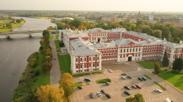 Aerial 4K video from drone to the city of Jelgava, Zemgale Palace in LLU Latvia. The largest baroque castle in the Baltics, located on the banks of the Rielpe River. Latvia, Jelgava, Zemgale