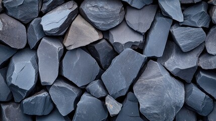 Rough volcanic rock creates a textured background with dark hues and sharp edges. The layout includes ample copy space making it suitable for overlays and creative designs