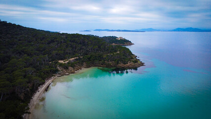 Fototapeta premium Aerial drone view of the island of Porquerolles with turquoise waters