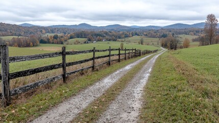 Fototapeta premium Autumnal country road, farm fence, mountain view, rural landscape, travel postcard