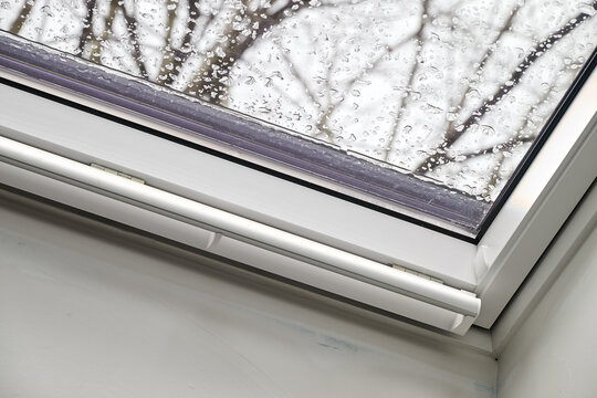 Repair and fixing  etaps of water damage on roof windows in Attic