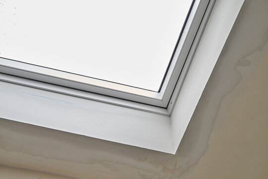 Repair and fixing  etaps of water damage on roof windows in Attic
