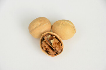 a top view of Cracked Walnuts on white background