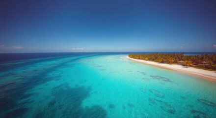 Aerial view of tropical island paradise with turquoise waters and a sandy beach on a sunny day.