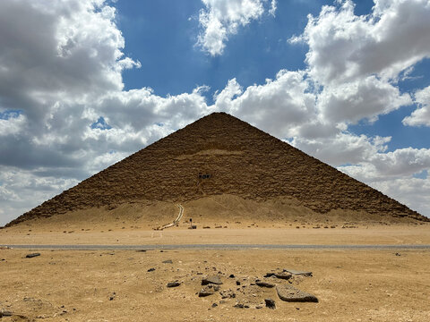 front view of red pyramid of snefru in Dahshur under a dramatic sky