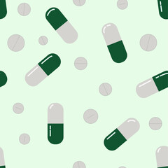 Green medical pills seamless pattern. Pills background. Pills and capsules pattern in green and white. A green medical illustration. Aseamless pattern with medical pills.