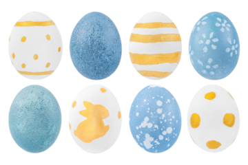 Easter eggs isolated on a white background. Handmade golden and blue Easter eggs. Easter celebration concept