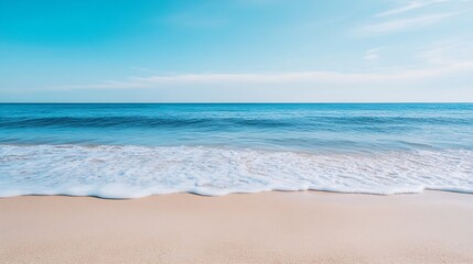 Fototapeta premium Serene beach view with soft waves lapping at the shore under a clear blue sky : Generative AI