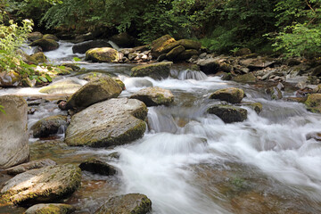Closeup of a waterfall on the East Lynn River, Devon, England