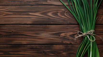 green onions on wooden background