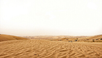 Naklejka premium Desert landscape with sand dunes and distant hills