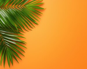 A vibrant palm leaf against a bright orange background, perfect for tropical decor.