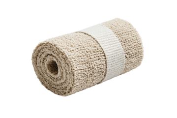 Soft beige towel rolled neatly for storage