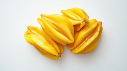 Fresh yellow starfruit cluster on white background