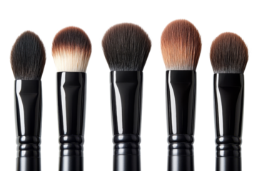 Five makeup brushes are neatly arranged in a line