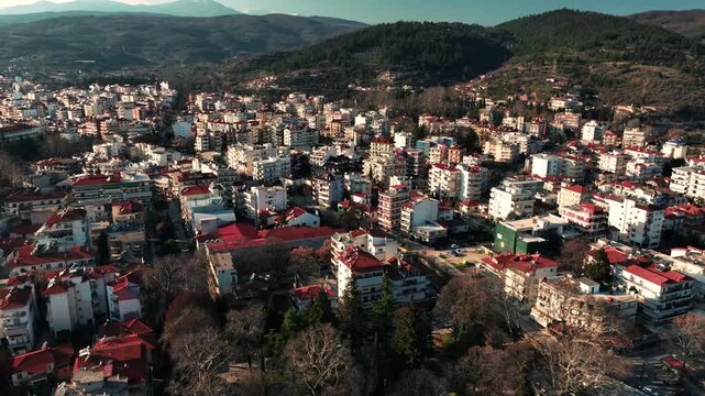 A revealing shot of the city of Edessa while watching the waterfalls