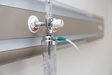 Hospital medical gas oxygen flowmeter, concentrator plugged in patient room. Healthcare Equipment,...