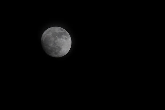 Close up moon on the Black sky - Powered by Adobe